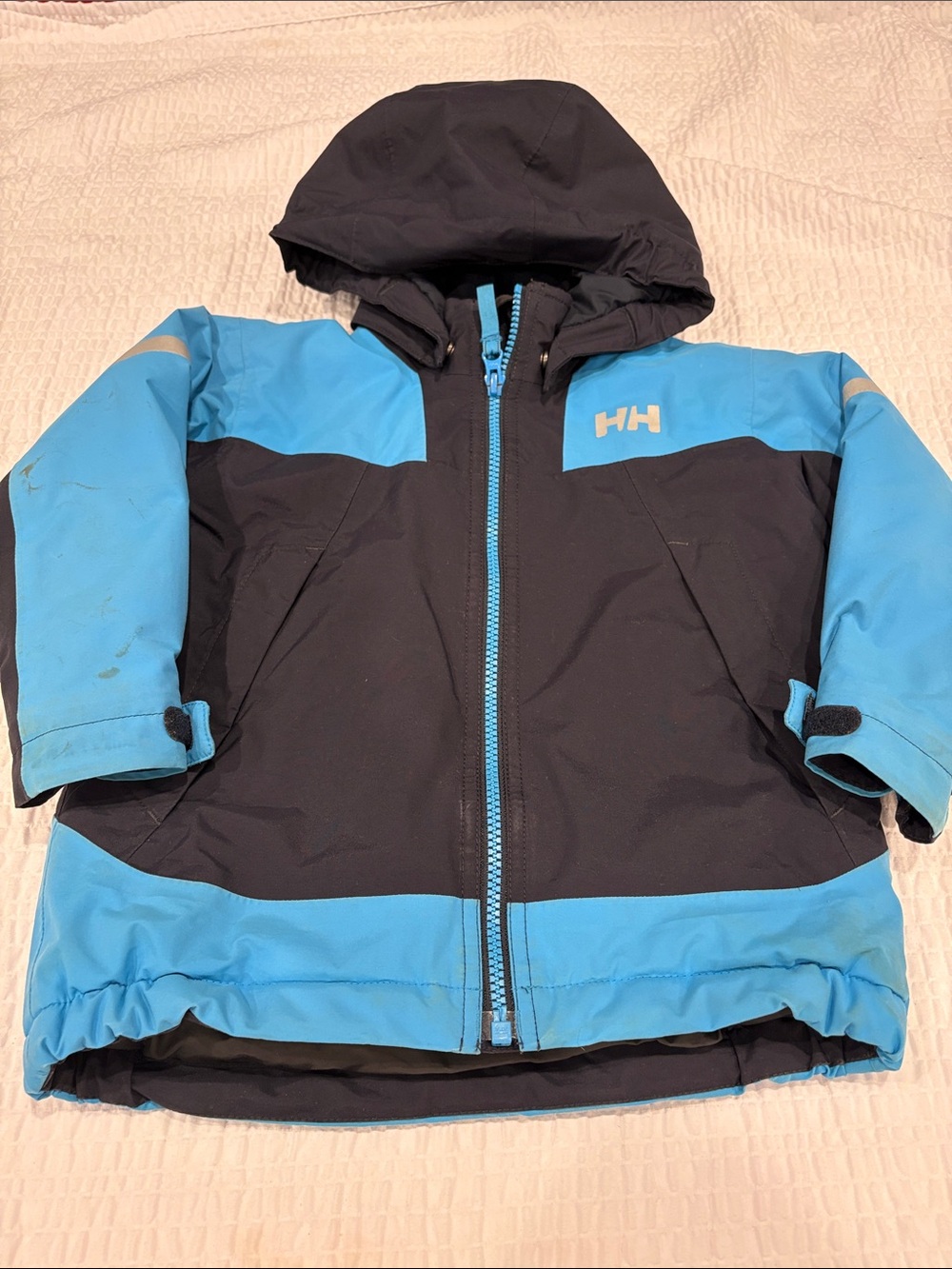 Helly Hansen Kids Black and Bright Blue Hooded Puffer Coat
Size 4